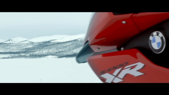 Video Reference: Red, Vehicle, Snow, Scooter, Automotive design, Car, Carmine