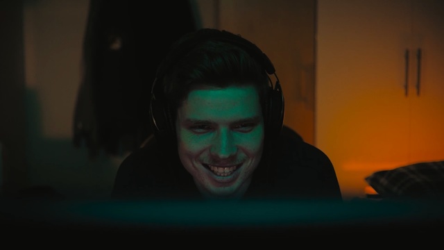 Video Reference: Face, Green, Black, Head, Forehead, Fun, Human, Mouth, Darkness, Smile, Person