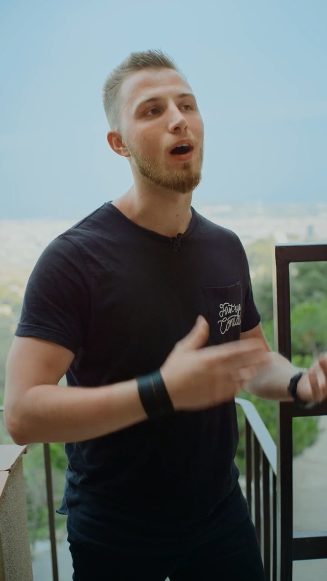 Video Reference: Arm, T-shirt, Neck, Shoulder, Joint, Human body, Muscle, Elbow, Top, Sleeve, Person