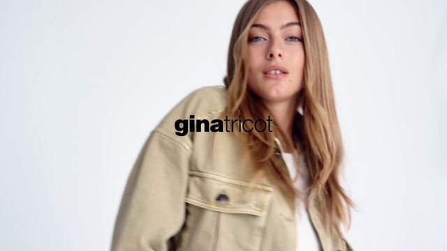 Video Reference: Hair, Clothing, Blond, Hairstyle, Outerwear, Long hair, Trench coat, Coat, Beige, Jacket