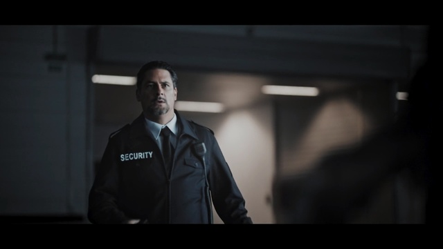 Video Reference: Photograph, Gentleman, Standing, Male, Photography, Flash photography, Darkness, Suit, Jacket, Screenshot, Person, Man, Indoor, Front, Looking, Holding, Monitor, Black, Wearing, Screen, Laptop, Dark, Television, Computer, Shirt, White, Room, Young, Human face, Clothing, Coat