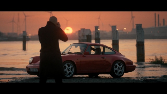 Video Reference: Land vehicle, Vehicle, Car, Regularity rally, Coupé, Porsche 911 classic, Automotive design, Sports car, Ruf ctr, Porsche 912, Person