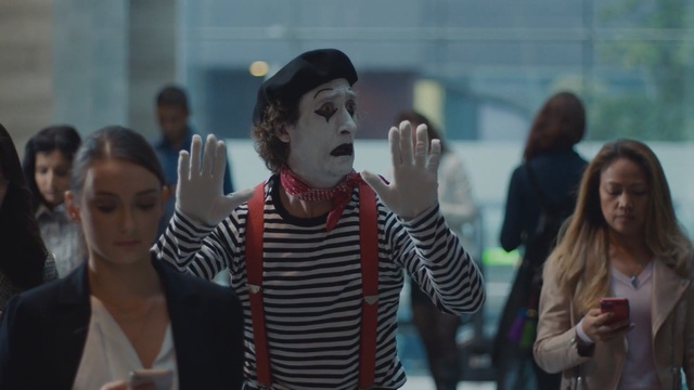 Video Reference: People, Youth, Mime artist, Human, Fun, Adaptation, Performance, Fictional character, Gesture, Zombie, Person, Building, Woman, Standing, Table, Looking, Holding, Front, Cake, Man, Group, Food, Birthday, Wine, Young, Shirt, Phone, White, Human face, Clothing, Crowd