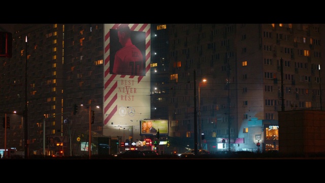 Video Reference: Building, Atmosphere, Skyscraper, Automotive lighting, Electricity, Tower block, Mode of transport, Street light, City, Facade