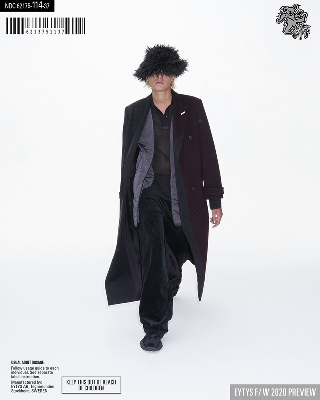 Video Reference: Clothing, Overcoat, Outerwear, Fashion, Coat, Formal wear, Headgear, Suit, Trench coat, Sleeve