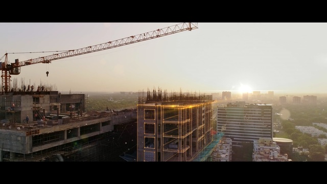 Video Reference: Sky, Urban area, Atmospheric phenomenon, Metropolitan area, City, Crane, Morning, Metropolis, Haze, Human settlement, Person