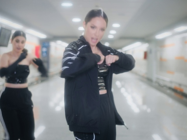 Video Reference: Fashion, Shoulder, Standing, Outerwear, Waist, Photography, Sleeve, Street fashion, Jacket