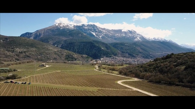 Video Reference: Mountainous landforms, Mountain, Highland, Mountain range, Sky, Hill, Natural landscape, Wilderness, Valley, Hill station