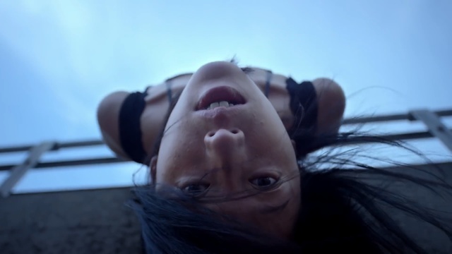 Video Reference: blue, face, sky, eye, girl, mouth, fun, human, audio equipment, neck