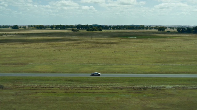 Video Reference: Grassland, Plain, Natural environment, Pasture, Land lot, Ecoregion, Grass, Sky, Field, Rural area