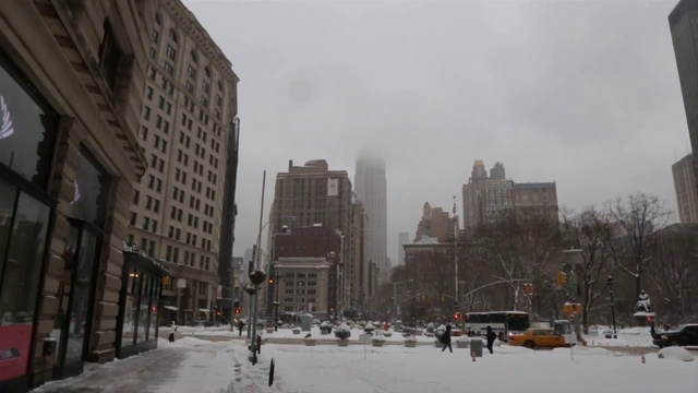 Video Reference: Snow, Urban area, City, Metropolitan area, Downtown, Winter, Human settlement, Atmospheric phenomenon, Neighbourhood, Building