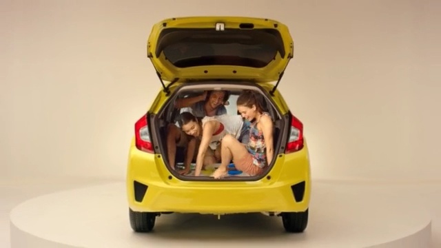 Video Reference: car, motor vehicle, vehicle, yellow, automotive design, mode of transport, auto show, vehicle door, automotive exterior, city car