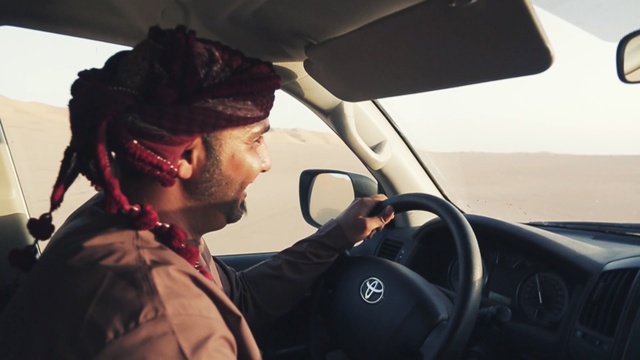 Video Reference: Driving, Windshield, Steering wheel, Vehicle, Automotive design, Vehicle door, Automotive exterior, Car, Facial hair, Automotive window part