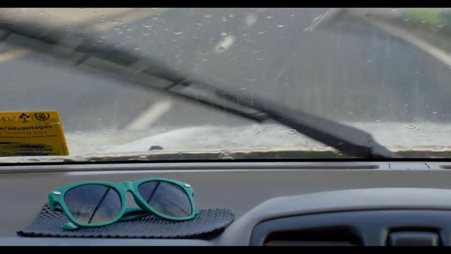 Video Reference: car, motor vehicle, windshield, windscreen wiper, glass, automotive mirror, green, vehicle registration plate, vehicle, rear view mirror