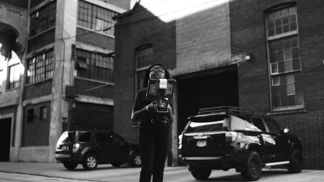 Video Reference: Car, Vehicle, Snapshot, Street, Mode of transport, Urban area, Architecture, Black-and-white, Infrastructure, Neighbourhood