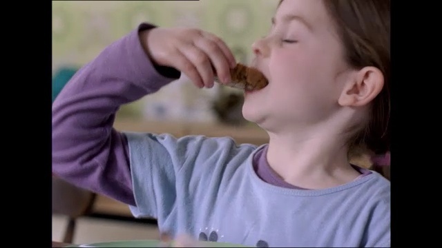 Video Reference: Face, Nose, Facial expression, Child, Cheek, Mouth, Head, Chin, Eating, Neck, Person