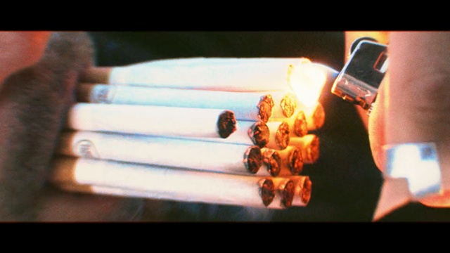 Video Reference: finger, hand, arm, cigarette, nail, tobacco products, Person