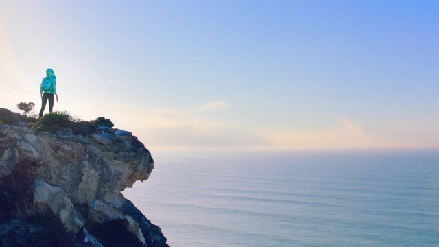 Video Reference: sea, sky, horizon, cliff, coast, ocean, promontory, water, headland, terrain