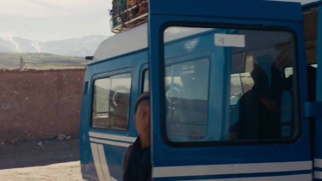 Video Reference: blue, transport, vehicle, mode of transport, car, public transport, window, automotive exterior, van, commercial vehicle