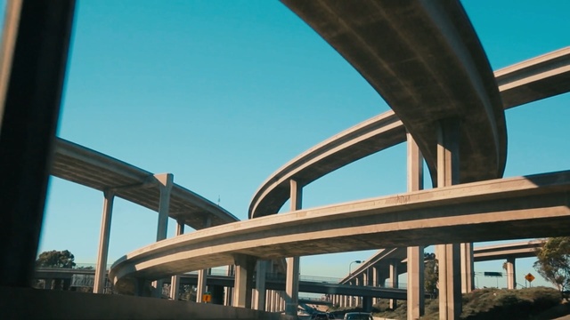 Video Reference: infrastructure, sky, architecture, fixed link, structure, overpass, daytime, skyway, bridge, building