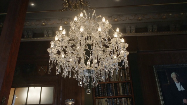 Video Reference: Chandelier, Light fixture, Lighting, Ceiling fixture, Light, Lighting accessory, Interior design, Incandescent light bulb, Ceiling, Room