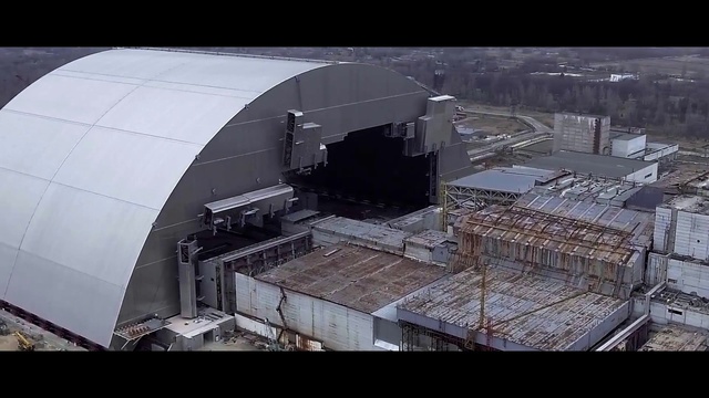 Video Reference: Architecture, Observatory, Photography, Dome, Building, Indoor, Table, Window, Kitchen, Sitting, Counter, Man, Large, Standing, Cake, Room, Wine, Display, Airplane, Train, White, Boat, Board, Jet, Track, Plane, People, Snow, Screenshot, Factory