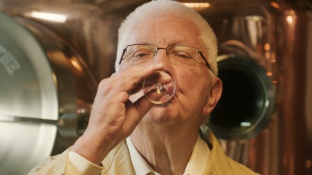 Video Reference: chin, glasses, facial hair, senior citizen, vision care, brass instrument, Person