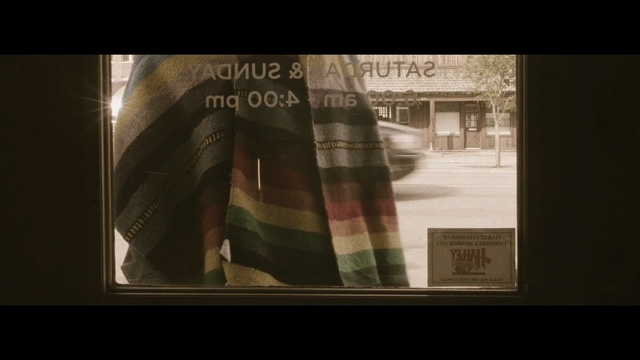 Video Reference: photograph, text, light, snapshot, darkness, screenshot, tourist attraction, font, shadow, advertising, Person