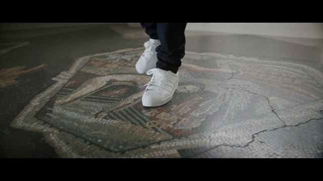 Video Reference: photograph, floor, flooring, shoe, material, outdoor shoe, foot, concrete, space