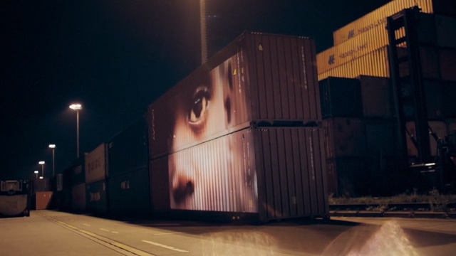 Video Reference: Light, Night, Lighting, Transport, Architecture, Infrastructure, Material property, Street light, Shipping container, Photography