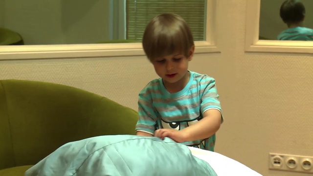 Video Reference: Child, Toddler, Arm, Sitting, Baby, Smile, Furniture, Ear, Play, Person