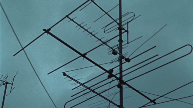 Video Reference: television antenna, overhead power line, electricity, electrical supply, technology, wire, sky, antenna, public utility, line, Person