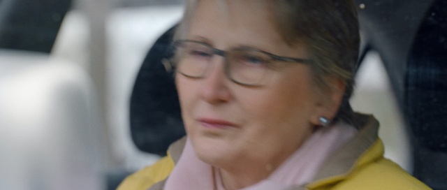Video Reference: Face, Eyewear, Hair, Eyebrow, Nose, Glasses, Forehead, Cheek, Chin, Skin, Person, Indoor, Wearing, Looking, Man, Young, Woman, Shirt, Camera, Dress, Sitting, Holding, Smiling, Girl, Standing, White, Red, Hat, Seat, Human face, Clothing