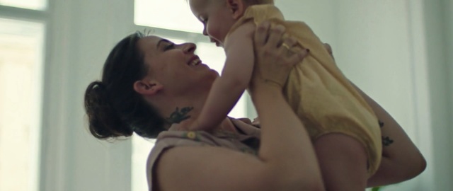 Video Reference: Male, Interaction, Arm, Romance, Mouth, Muscle, Love, Black hair, Gesture, Neck, Person, Indoor, Woman, Man, Looking, Holding, Front, Young, Sitting, Brushing, Girl, Teeth, Mirror, Shirt, Phone, Standing, Brush, Room, Wall, Human face, Baby, Toddler, Hand, Boy