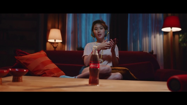 Video Reference: Facial expression, Red, Fun, Lighting, Human, Sitting, Child, Human body, Hand, Room