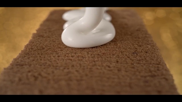 Video Reference: flooring, icing, baking, buttercream, floor, material, Person