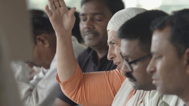 Video Reference: man, men, woman, people, hand, glasses, Indian, Person