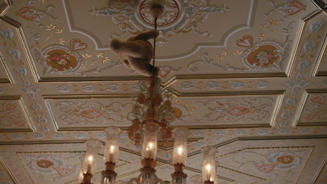 Video Reference: Ceiling, Lighting, Light fixture, Chandelier, Room, Plaster, Molding, Bronze, Ceiling fixture, Metal