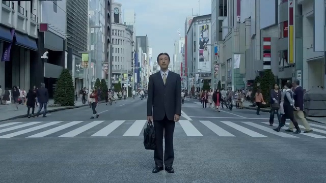 Video Reference: Road, Street, Pedestrian, Lane, Photograph, Urban area, Pedestrian crossing, Town, Snapshot, Human settlement, Person