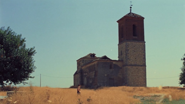 Video Reference: sky, church, historic site, building, rural area, steeple, tree, medieval architecture, chapel, place of worship