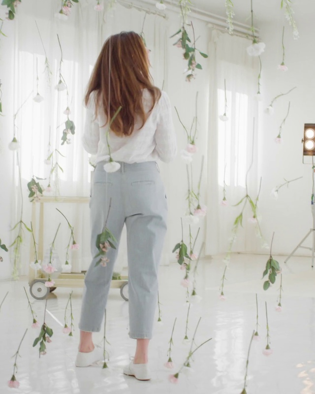 Video Reference: White, Clothing, Shoulder, Pink, Jeans, Waist, Outerwear, Leg, Trousers, Textile