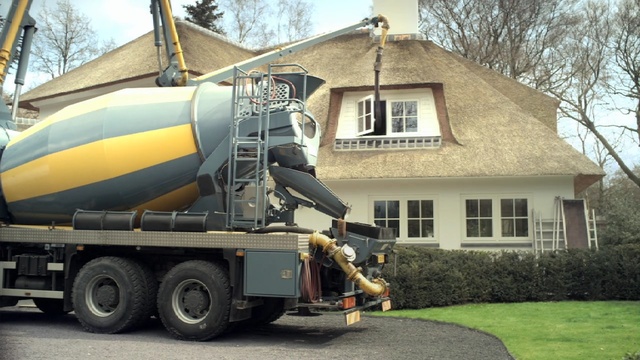 Video Reference: transport, concrete mixer, vehicle, motor vehicle, tree, plant, asphalt, hardware, truck, public utility