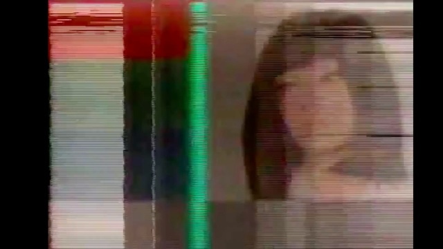 Video Reference: green, red, blue, yellow, light, close up, textile, line, material, wood stain, Person