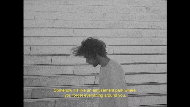 Video Reference: Text, Wall, Snapshot, Human, Photography, Font, Black-and-white, Adaptation, Photo caption, Brick