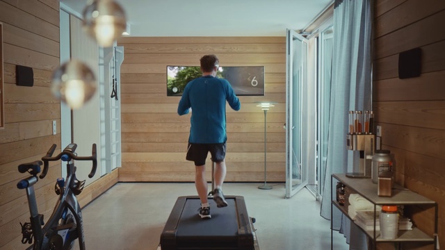 Video Reference: Standing, Shoulder, Room, Joint, Physical fitness, Balance, Interior design, House, Building, Person, Indoor, Table, Living, Suitcase, Man, Woman, Small, Young, Front, Luggage, Sitting, Holding, Suit, Boy, Computer, Desk, Kitchen, White, Floor, Door, Wall, Footwear, Shorts, Clothing, Trousers