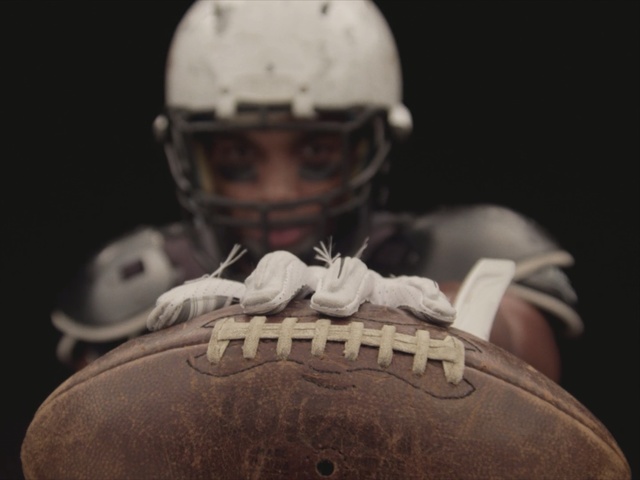 Video Reference: Helmet, Sports gear, Personal protective equipment, Football gear, Football equipment, Football helmet, American football, Sports equipment, Team, Player