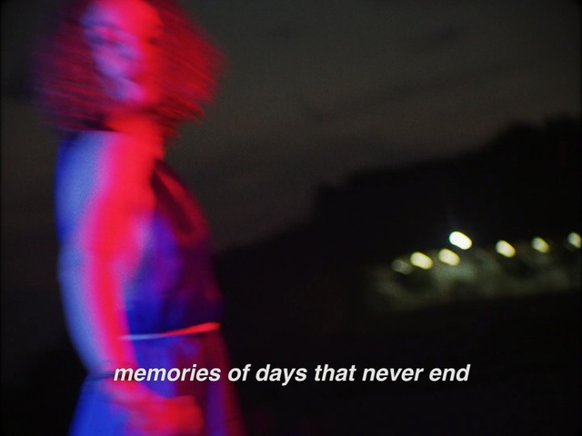 Video Reference: Light, Visual effect lighting, Lighting, Magenta, Performance, Stage, Music, Dark, Man, Blurry, Holding, Sitting, Video, Game, Wearing, Red, Playing, Woman, Room, Standing, Young, Remote, White, Blur