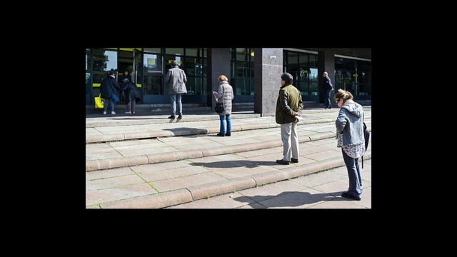 Video Reference: Photograph, Standing, Snapshot, Text, Pedestrian, Public space, Human, Street, Photography, Infrastructure