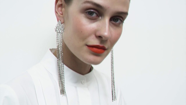 Video Reference: Forehead, Nose, Face, Lip, Chin, Eyebrow, Hairstyle, Shoulder, Eyelash, Street fashion