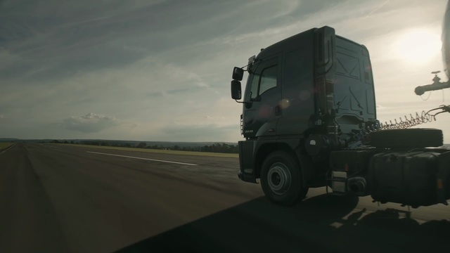 Video Reference: road, motor vehicle, transport, vehicle, mode of transport, truck, commercial vehicle, automotive tire, automotive wheel system, tire